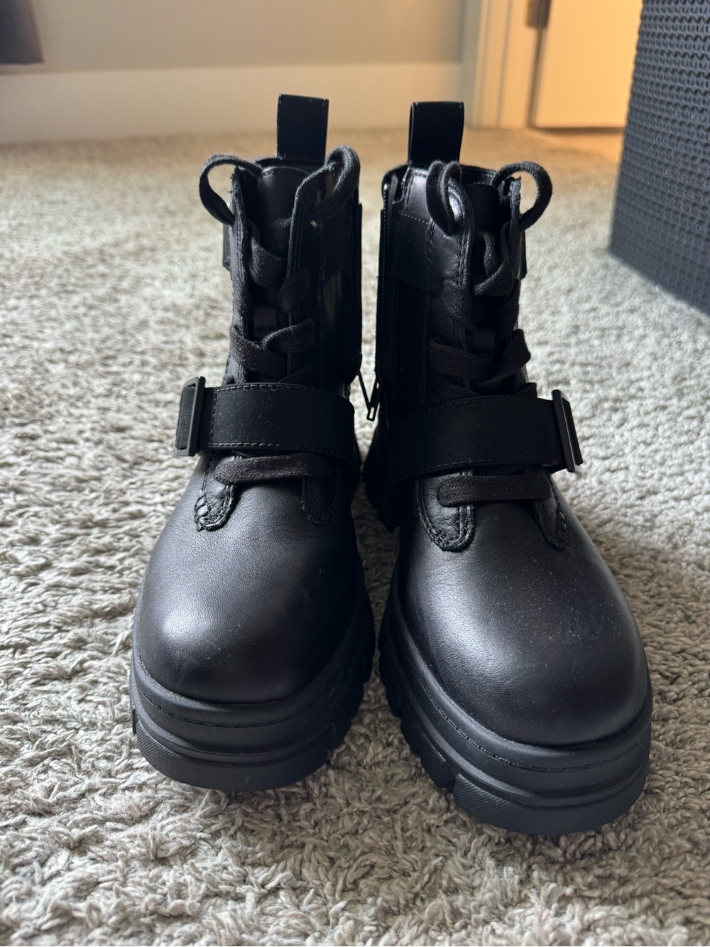 UGG Black Leather Lug Sole Combat Boots Buckle Strap Platform Ankle Boots